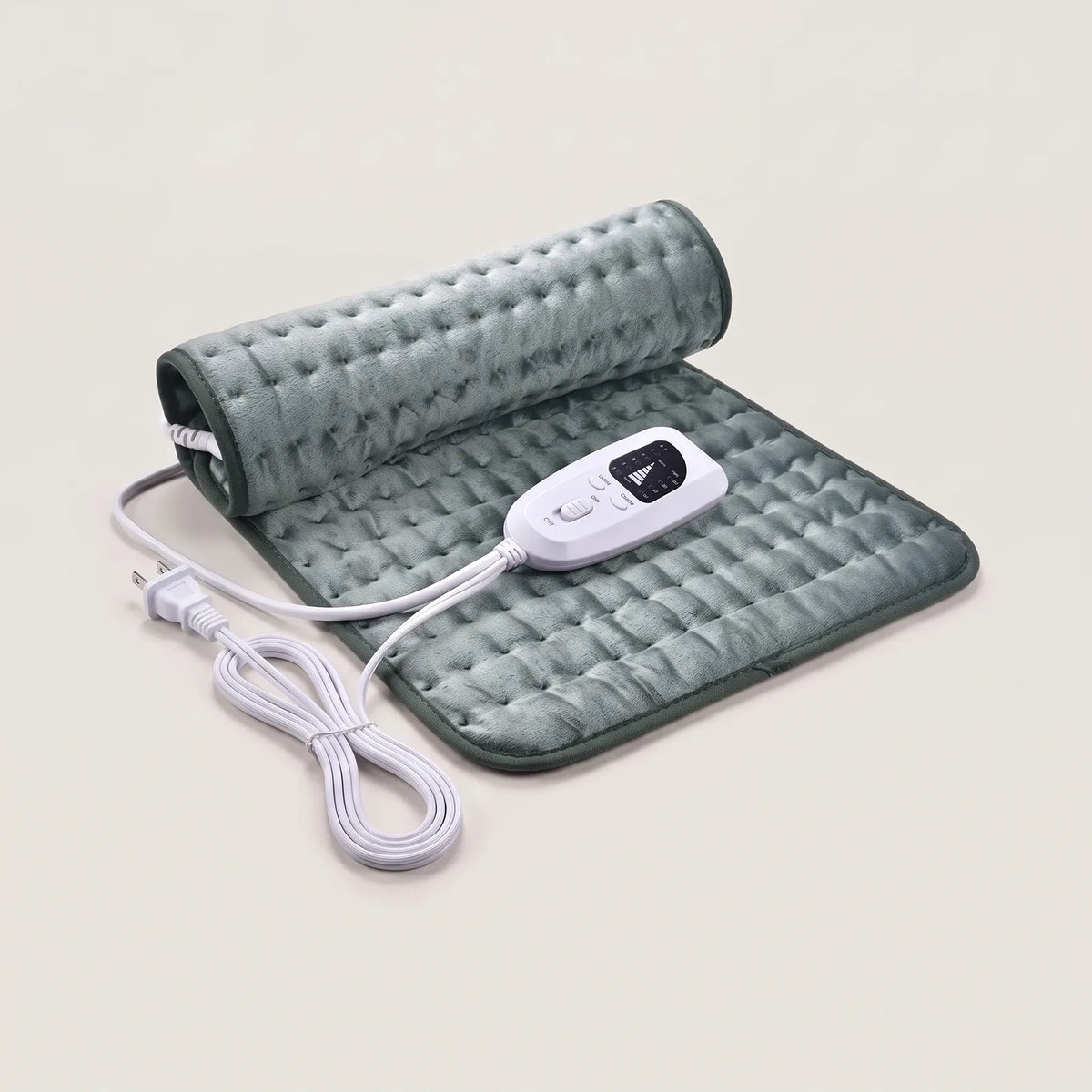 BergHeat Hearth heating pad in sage green, half rolled, with hand controller and US plug